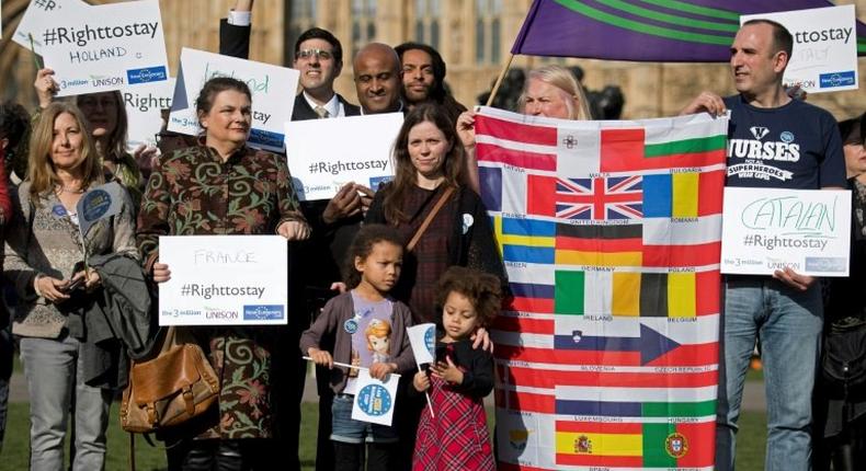 European workers including nurses, social workers and teaching assistants demonstrate against Brexit outside the Houses of Parliament in London