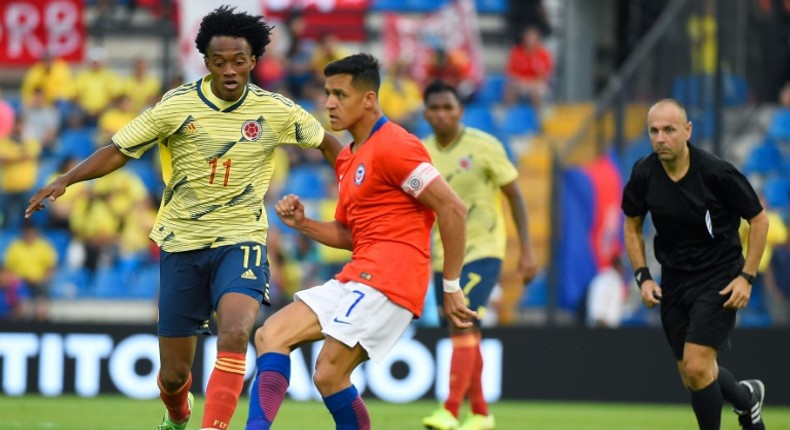 Alexis Sanchez captained Chile against Colombia until he injured an ankle