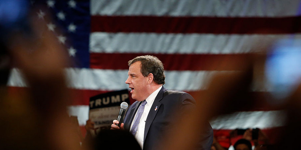 New Jersey Governor Chris Christie speaks on stage prior to Republican presidential candidate Donald Trump's town hall meeting on March 14, 2016 at the Tampa Convention Center in Tampa , Florida.