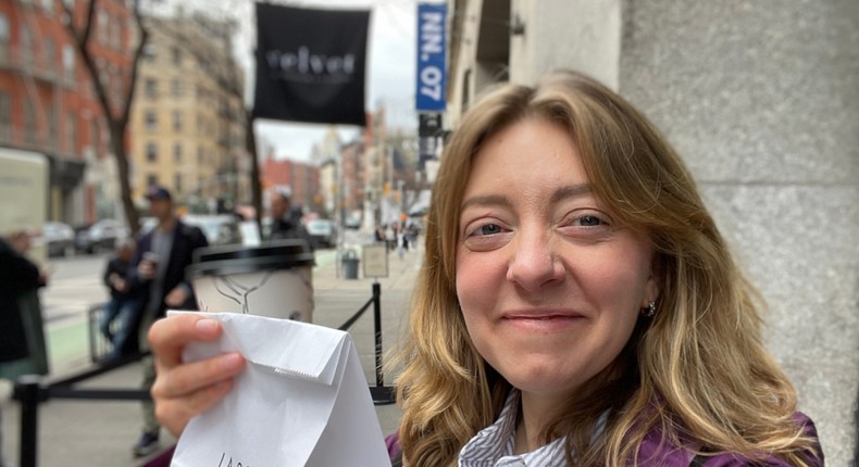 The author holds a matcha latte and bagged treat outside La Cabra in Manhattan's SoHo neighborhood.Melia Russell/Business Insider