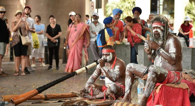 Indigenous Australians performing in Sydney on Australia Day, which celebrates the origins of the modern nation. Many indiginous Australians, however, mark the day with mourning