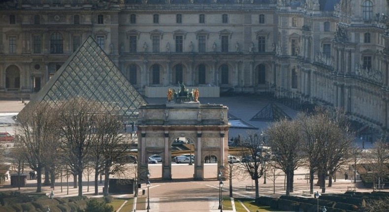 Tourists were cleared from around the Louvre museum in Paris on February 3, 2017 after a soldier shot a machete-wielding man