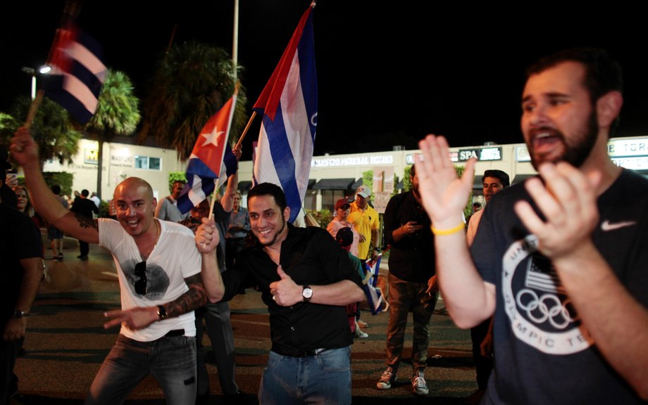 People celebrate after the announcement of the death of Cuban revolutionary leader Fidel Castro in the Little Havana district of Miami, Florida, November 26, 2016.