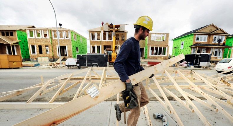 A construction worker building new homes.