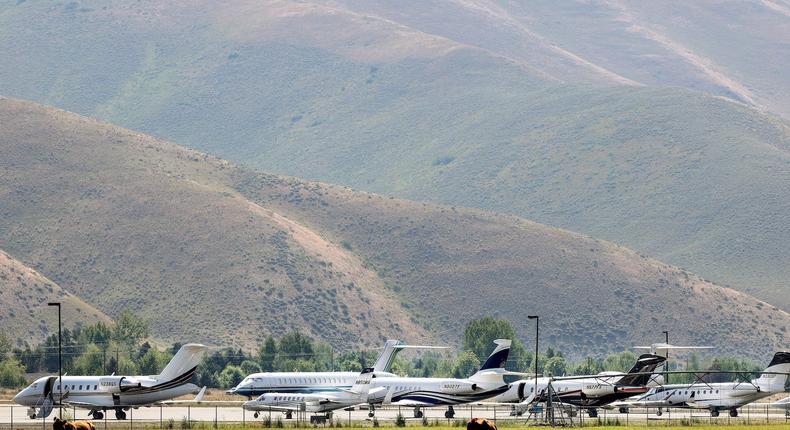 Private jets park alongside grazing cows at Friedman Memorial Airport in Sun Valley, Idaho, ahead of the 2021 Allen & Co. Sun Valley Conference.Kevin Dietsch/Getty Images