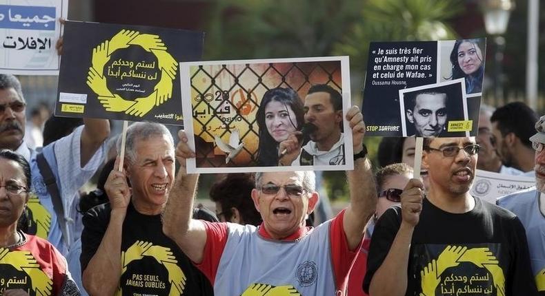 Protesters take part in a demonstration called by Amnesty International on the International Day in Support of Victims of Torture, in Rabat, Morocco June 26, 2015. 