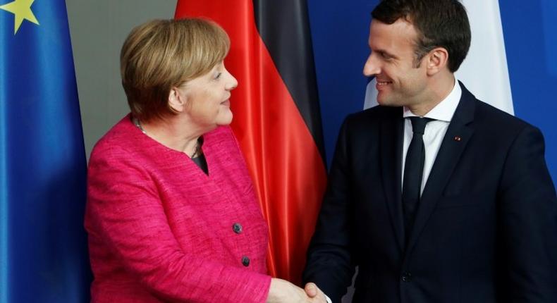 German Chancellor Angela Merkel (L) and French President Emmanuel Macron in Berlin on May 15, 2017