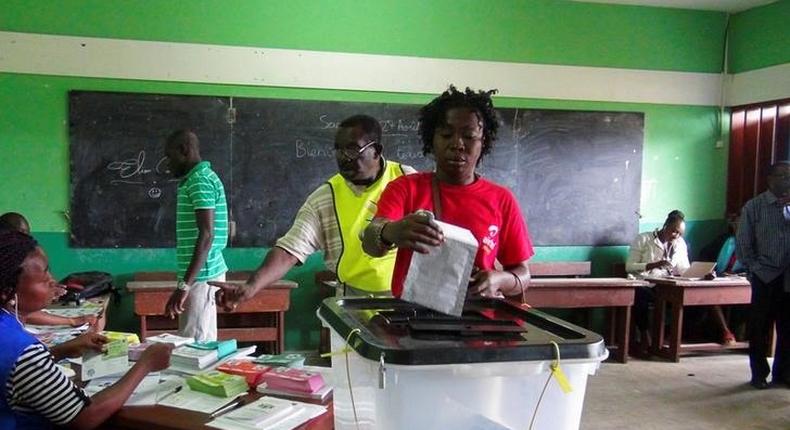 A woman votes during the presidential election in Libreville, Gabon, August 27, 2016. 