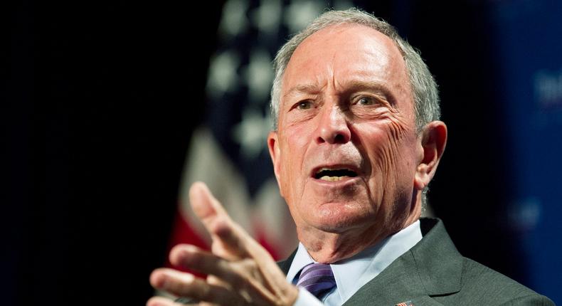 Michael Bloomberg could buy Wall Street Journal parent Dow Jones or Jeff Bezos' Washington Post, Axios reports.AP