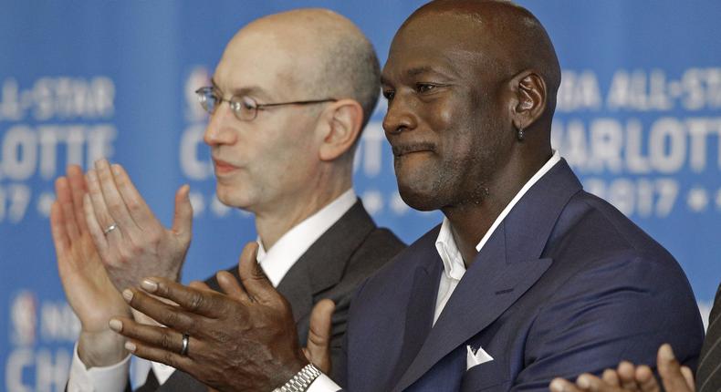 Charlotte Hornets owner Michael Jordan, right, and NBA commissioner Adam Silver.