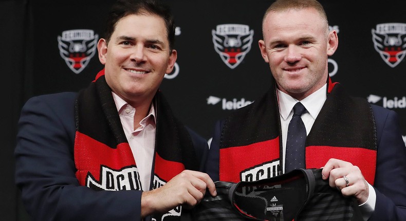 Jason Levien (left) with Wayne Rooney.Patrick McDermott/Getty Images