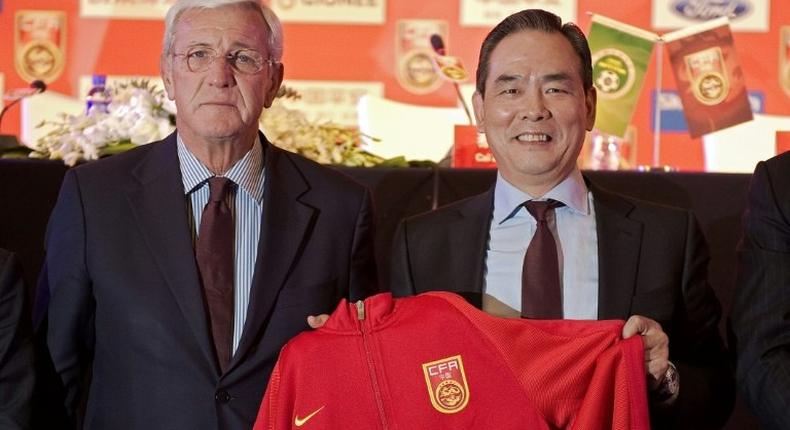 China's national football coach Marcello Lippi (L) admits his team need a 'miracle' to reach the 2018 World Cup in Russia