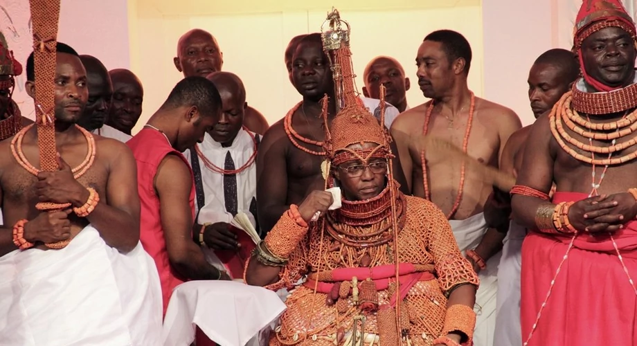 You should not do any of these while visiting the Oba's palace in Benin