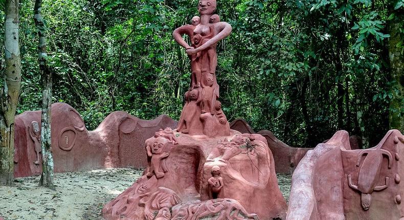 a statue signifying the maternity nature of iya osun at the sacred grove of oshun {culture trip}