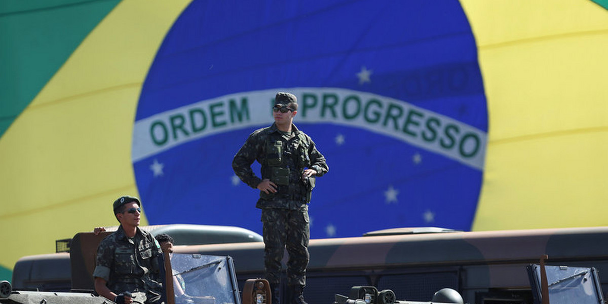 Brazilian police and special military forces are pictured outside the Mane Garrincha Stadium in Brasilia.