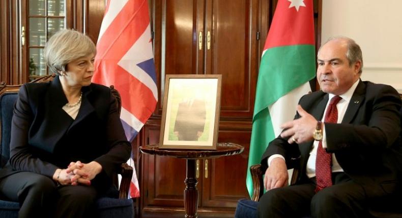 British Prime Minister Theresa May meets Jordanian Prime Minister Hani Mulqi in Amman on April 3, 2017