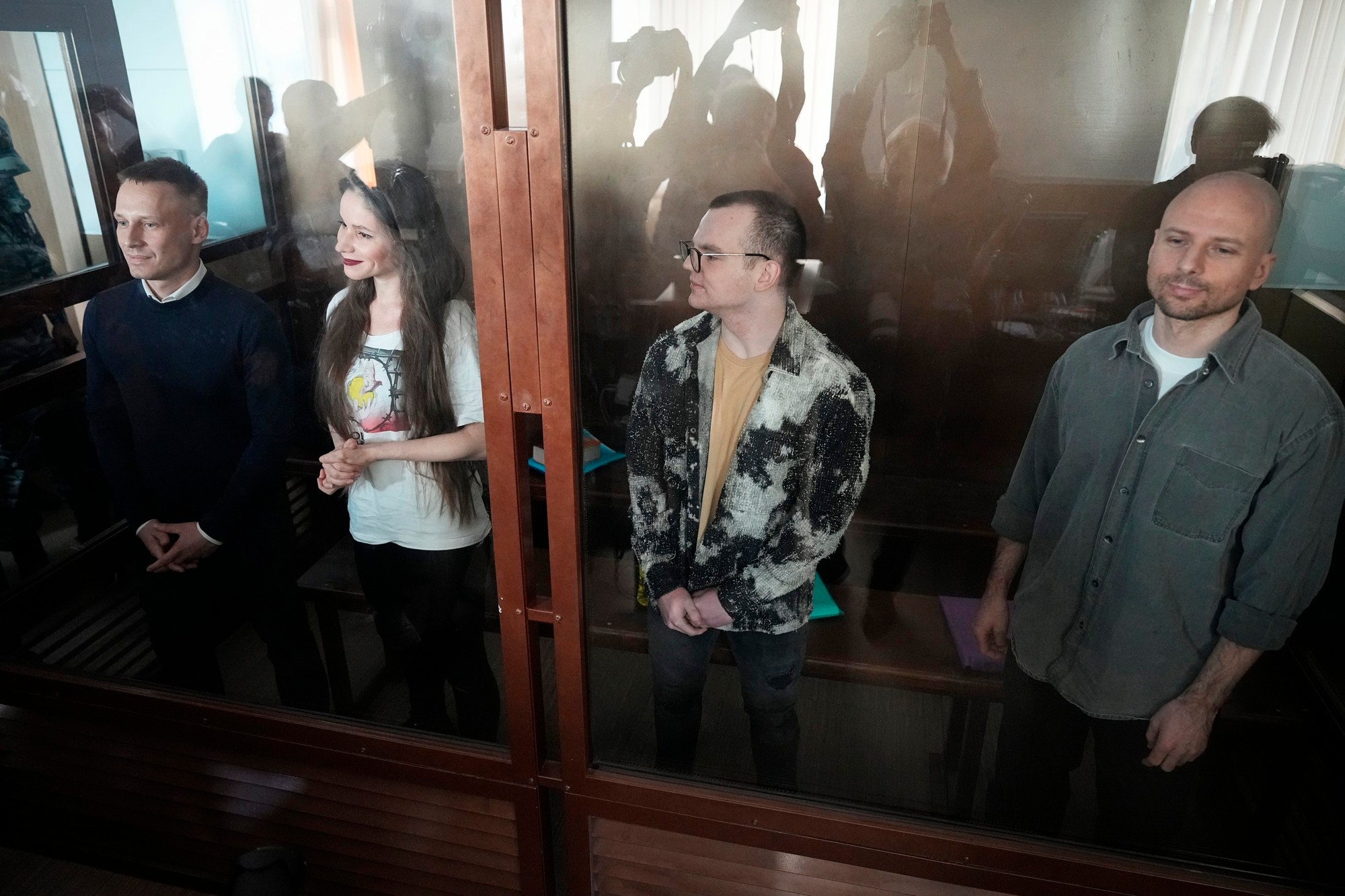 Ruskí novinári, zľava Konstantin Gabov, Antonina Favorská, Arťom Kriger a Sergej Karelin.