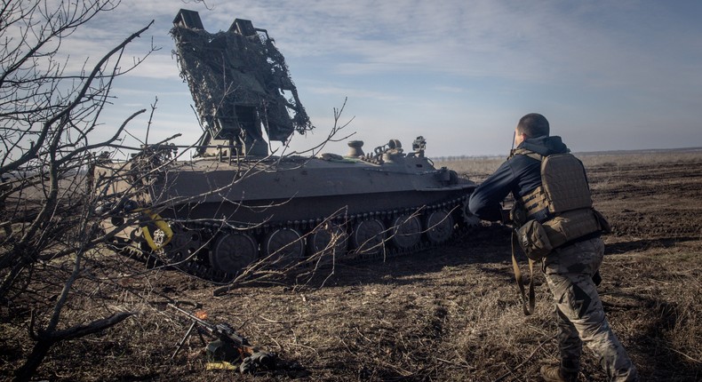 A Ukrainian soldier runs to position as the 72nd Brigade Anti-air unit prepares to fire a Strela-10 anti-air missile system.Chris McGrath/Getty Images