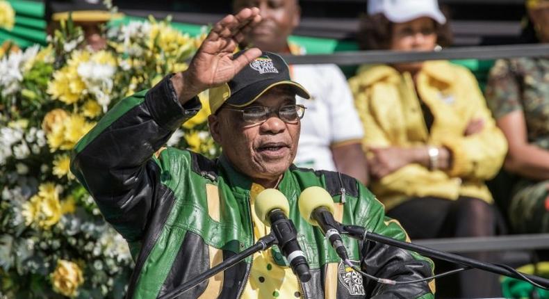 South African ruling African National Congress (ANC) president Jacob Zuma gestures as he gives his speech during the ANC closing rally campaign for the municipal elections at Ellis Par Stadium on July 31, 2016 in Johannesburg, South Africa 