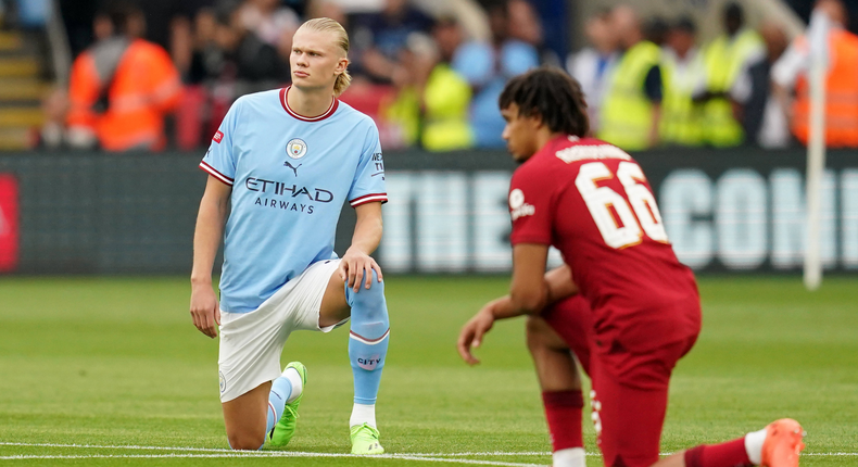 Manchester City's Erling Haaland and Liverpool's Trent Alexander-Arnold take the knee before their FA Community shield clash on Saturday July 30,2022.