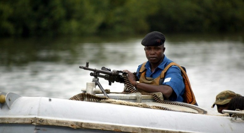 Naval security operatives patrol the creeks of Niger Delta in Buguma.