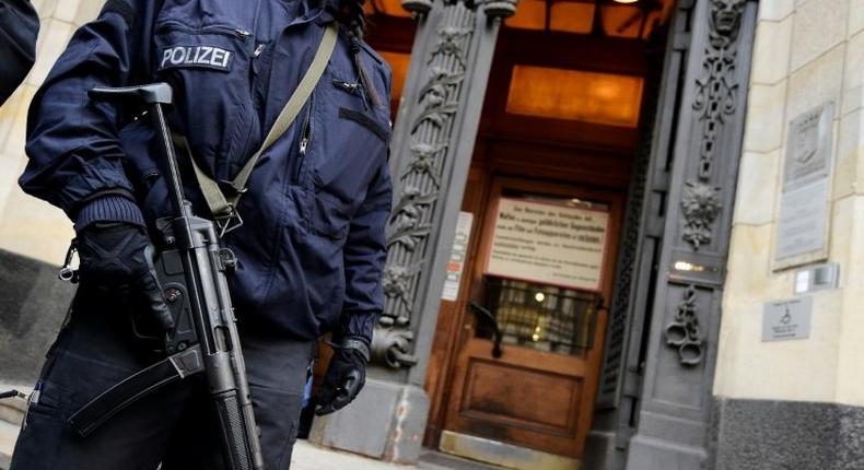 Policemen secure the area in front of Berlin's Supreme Court where the trial against alleged Islamic State jihadist, Shaas Al Mohammad, was beginning on January 4, 2017