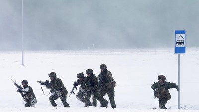 Canadian troops along with other troops from11 NATO nations take part in the exercise in urban warfare during Iron Sword exercise in the mock town near Pabrade