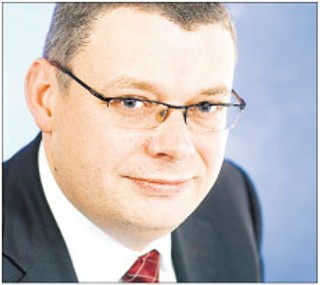 Komentarz redakcji: W czym ma pomóc podatek bankowy