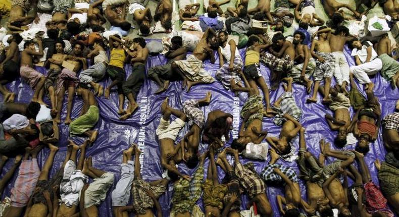 Malaysian police find more bodies of migrants from Indonesian boat