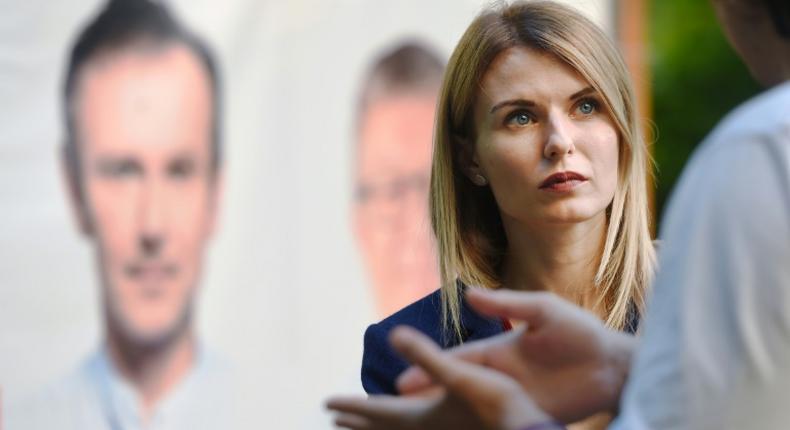 Lesya Vasylenko, lawyer, human rights activistand candidate of Ukrainian party Golos (Voice), headed by the Ukrainian rock star Svyatoslav Vakarchuk, talks with voters during a campaign meeting, ahead of the country's July 21 parliamentary election, in Kiev on July 16, 2019. Ukrainians elected Zelensky, a comedian with no political experience in April and parliamentary polls look likely to follow the same trend: out of the five parties leading in opinion polls, two are newly created: Golos and Zelensky's own party Servant of the People. The average age of their candidates is 37 and no one has previously served as MPs