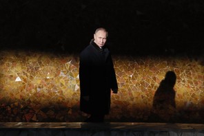 Russian President Putin attends a wreath laying ceremony at the eternal flame during an event to com