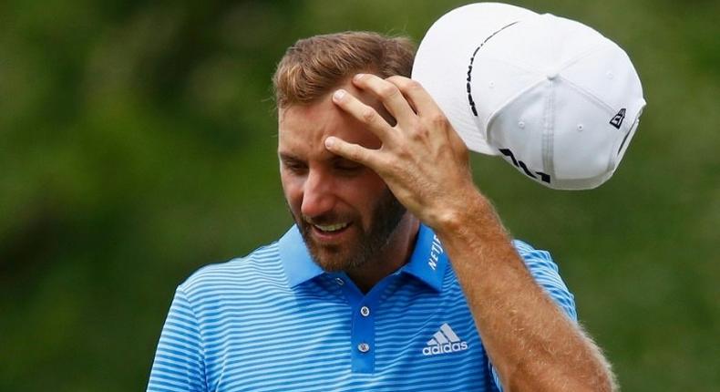 Dustin Johnson of the United States stands on the green during a practice round prior to the 2017 U.S. Open at Erin Hills on June 14, 2017 in Hartford, Wisconsin