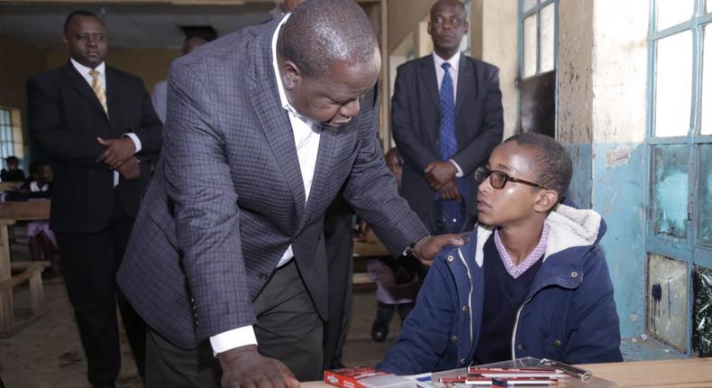 CS Fred Matiang’i shows his soft side with kind prayer to KCPE candidates at Gilgil school