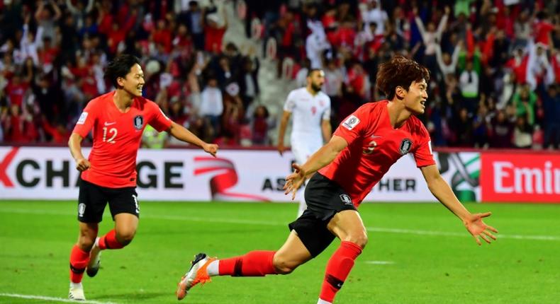 Jin-Su Kim celebrates his extra-time match-winner as South Korea beat Bahrain to reach the Asian Cup quarter-finals