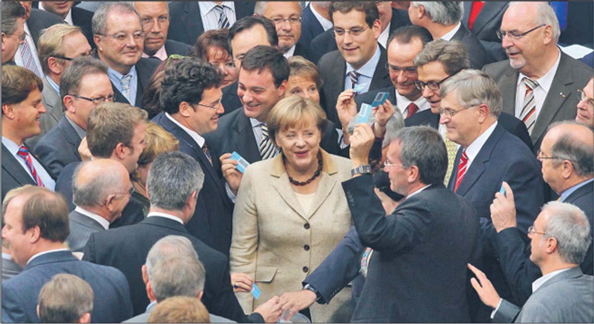Udane głosowanie znacznie wzmocniło pozycję kanclerz Angeli Merkel Fot. PAP/EPA