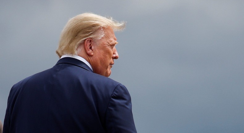 President Donald Trump walks on the tarmac as he arrives on campaign travel at Dobbins Air Force Reserve Base in Marietta, Georgia, on September 25, 2020.