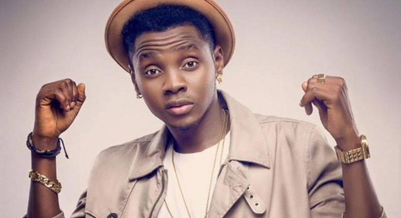 Kiss Daniel lost his dad on Saturday, May 9, 2015