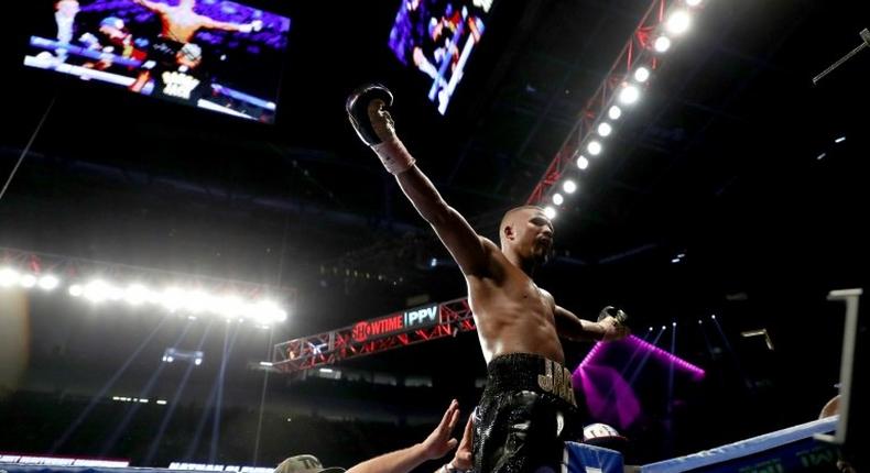 Badou Jack celebrates after dominating British star Nathan Cleverly from start to finish