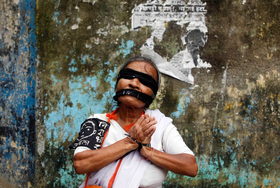 A social activist participates in a rally in Mumbai