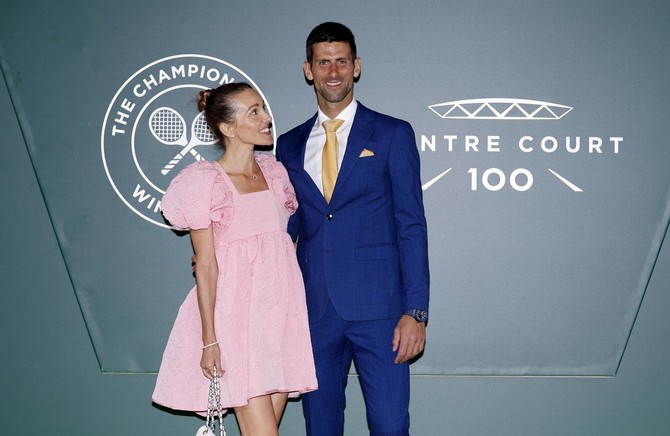 Jelena i Novak Đoković na Vimbldonskoj večeri u Londonu foto:  Steven Paston/PA Images