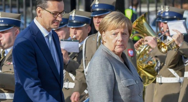 Poland is unlikely to adopt the UN migration pact, Prime Minister Mateusz Morawiecki told a press conference with German Chancellor Angela Merkel