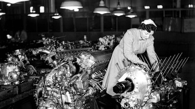 World War Two. 1942. England. A woman at work during the war making Rolls Royce Merlin aircraft engi