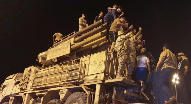 Forces loyal to Libya's UN-recognized Government of National Accord parade a Pantsir air defense system truck in the capital Tripoli on May 20, 2020 after its capture at a nearby airbase from strongman Khalifa Haftar