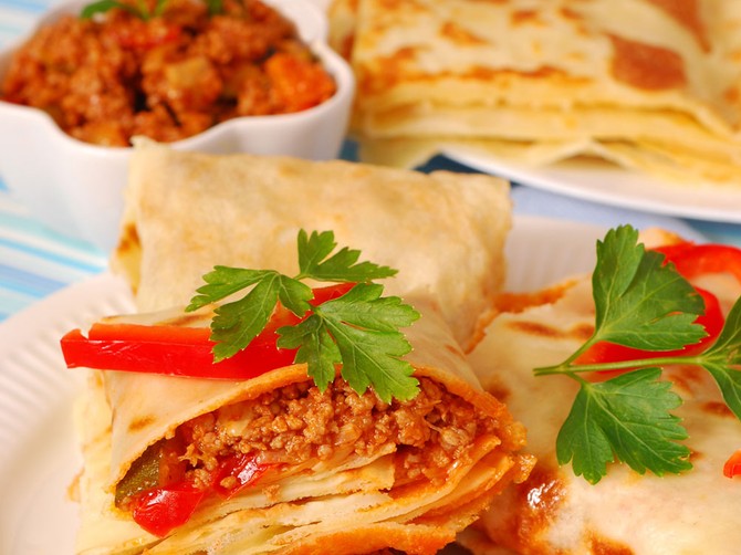 20395_stock-photo-pancakes-stuffed-with-minced-meat-and-vegetables-in-bolognese-sauce-shutterstock_65293066
