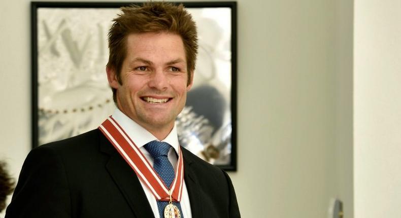 Former New Zealand All Blacks captain Richie McCaw speaks to the media after receiving the Order of New Zealand award, at Government House in Wellington, in April 2016