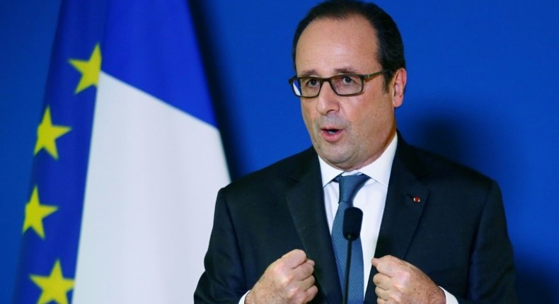 French President Francois Hollande gestures as he delivers a speech in Paris, on November 24, 2016