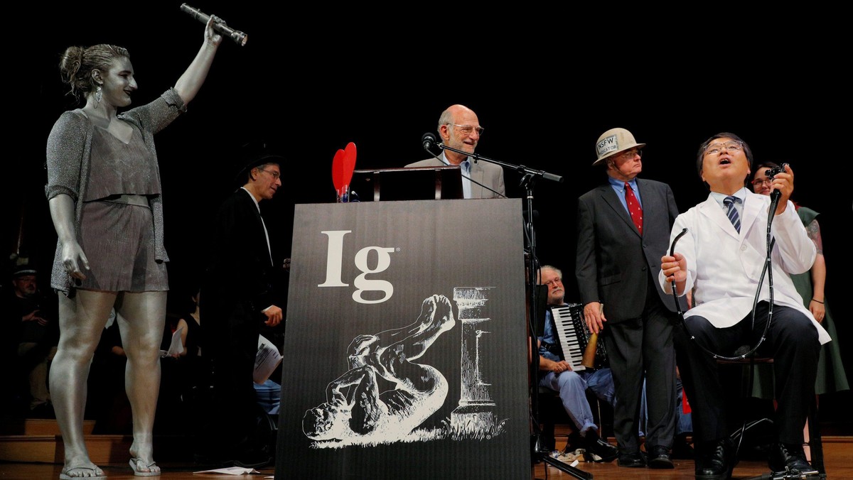 Horiuchi of Japan accepts the Ig Nobel for Medical Education during the Ig Nobel awards ceremony at 