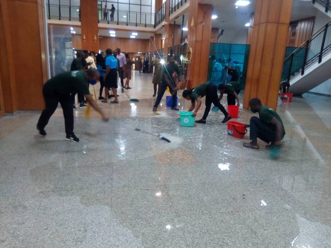National Assembly complex lobby being mopped after the roof leaked rainwater [Punch]