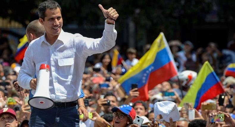 Venezuelan opposition leader Juan Guaido told supporters that he will tour the country and then lead a march on Caracas as he battles with President Nicolas Maduro for power