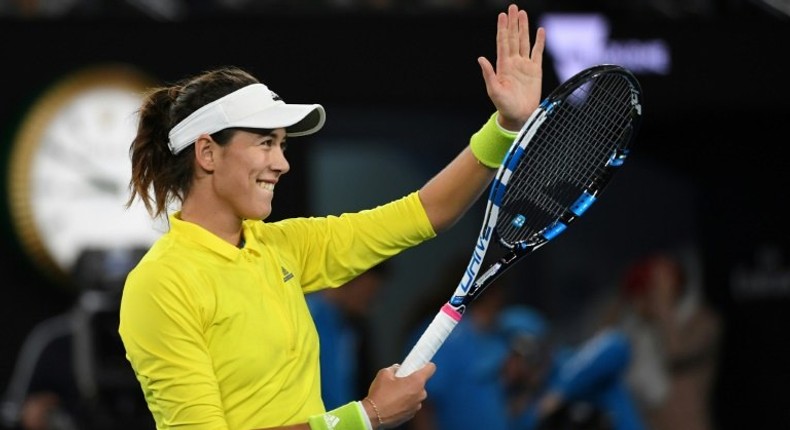 Spain's Garbine Muguruza struggled through 7-5, 6-4 against the US' Samantha Crawford to reach the Australian Open third round